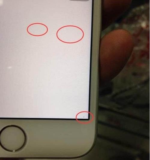 iphone屏幕上两个白点