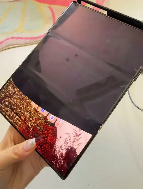 华为折叠屏中间出现了一个小绿点是摔坏了吗?图标